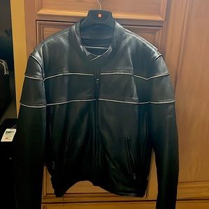 Heavy duty Motorcycle jacket. Use for cold weather riding. Has white striping.
